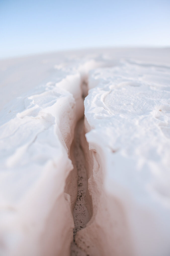 A close up shot of the White Desert, Egypt, focusing on the detailed texture of chalk formations with soft pastel colors, creating a gentle and sooth